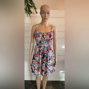 Women’s B.SMART floral dress with back zip up and adjustable straps.